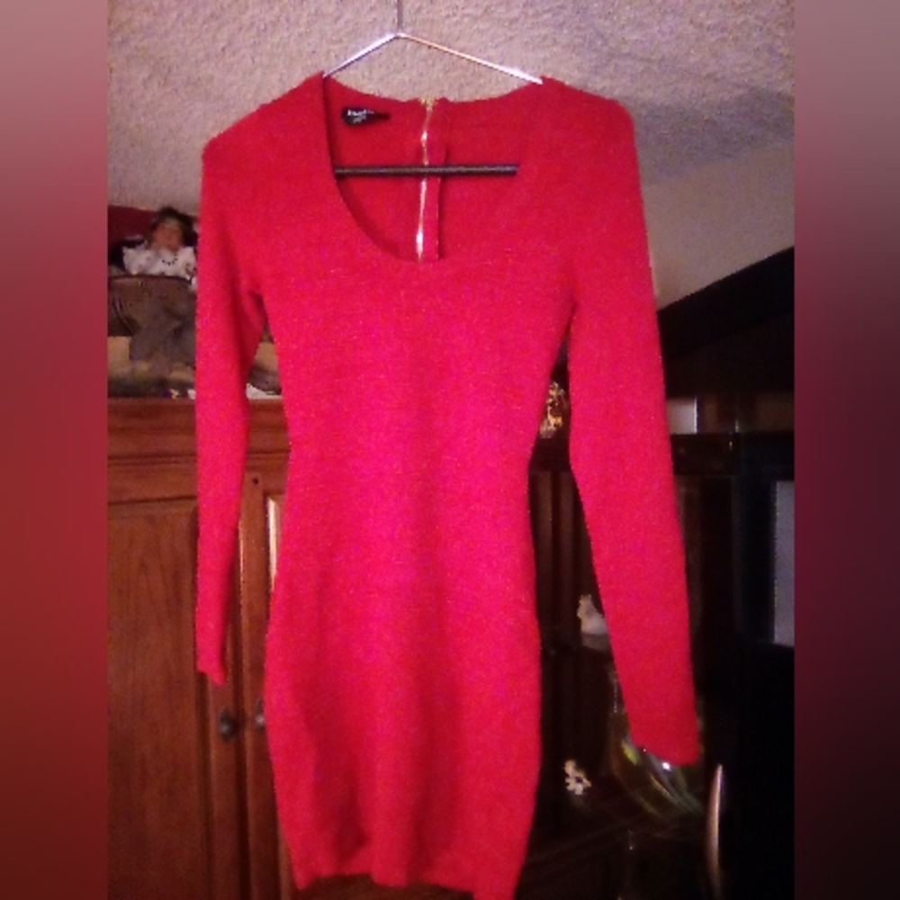 Red long sleeve sweater dress by Bebe